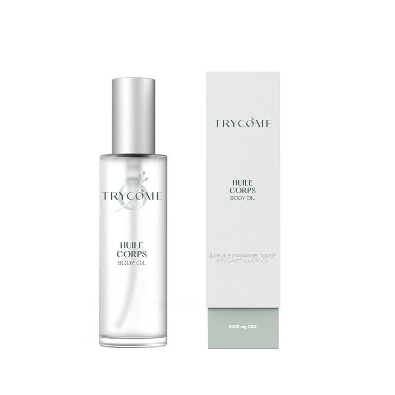 Flacon en verre de l’huile hydratante pour le corps Trycome, infusée à 2000 mg de CBD, présenté dans un packaging minimaliste blanc et vert.