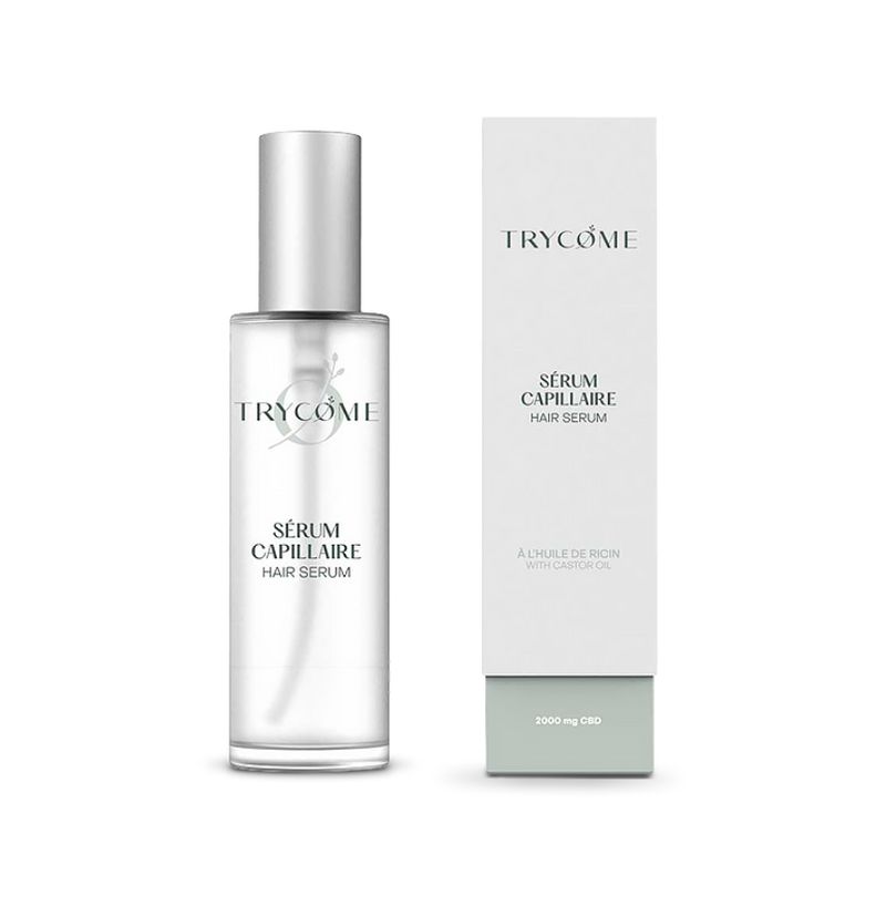 Flacon de sérum capillaire Trycome à base de CBD et d’huile de ricin, présenté avec son étui blanc minimaliste.